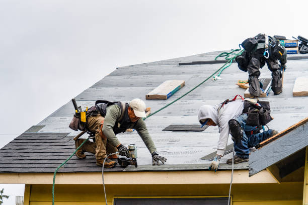 Professional Gutter Installation technician working in Midland, WA